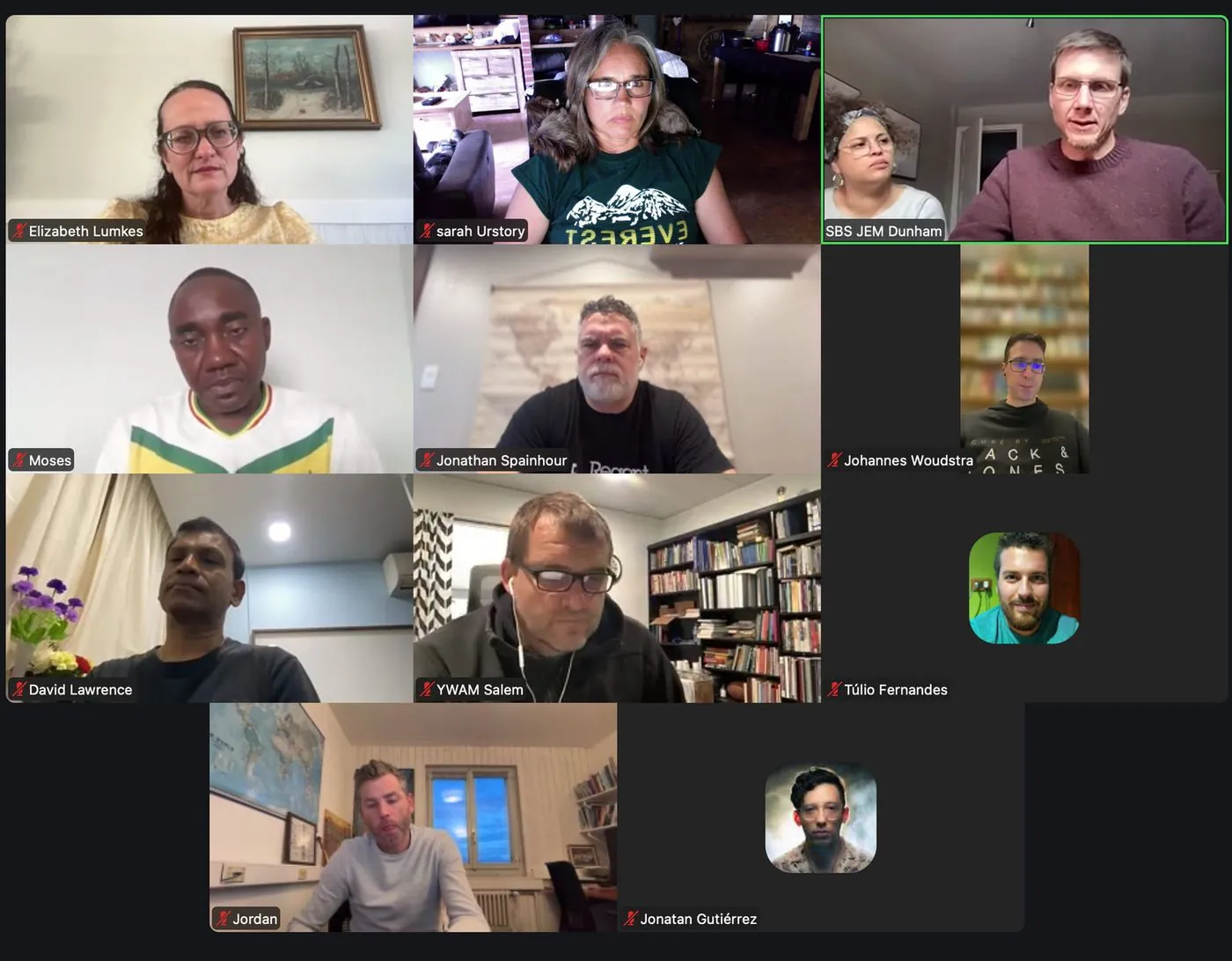 A screenshot of a video meeting with many small participant tiles.