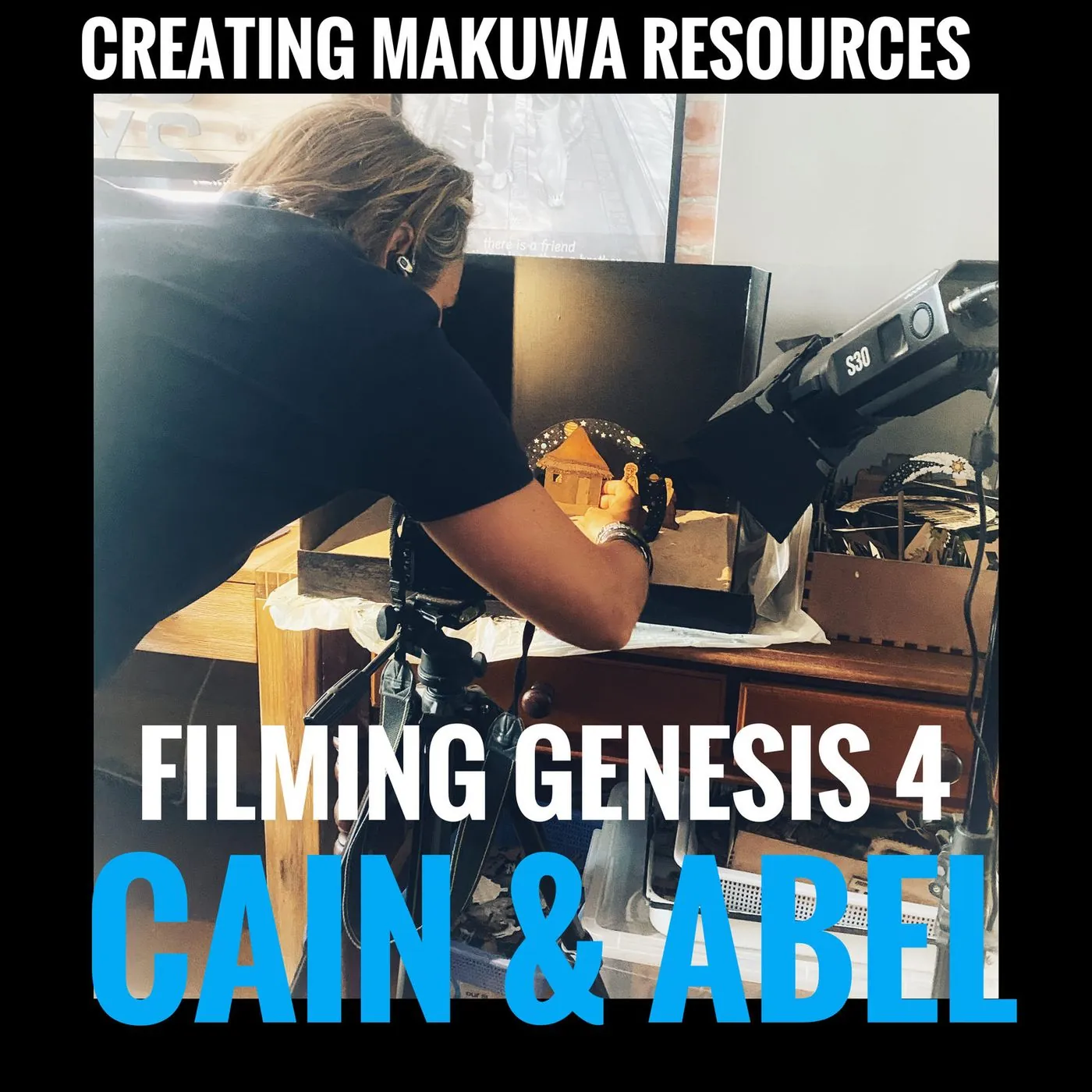 A man with a camera films a set, captioned Creating Makuwa resources, Filming Genesis 4 Cain and Abel.