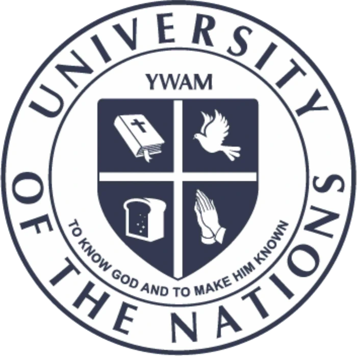 The University of the Nations seal: a round badge with a shield showing a Bible, a dove, bread and praying hands, YWAM above the shield and the words To know God and to make Him known, inside a ring reading University of the Nations.
